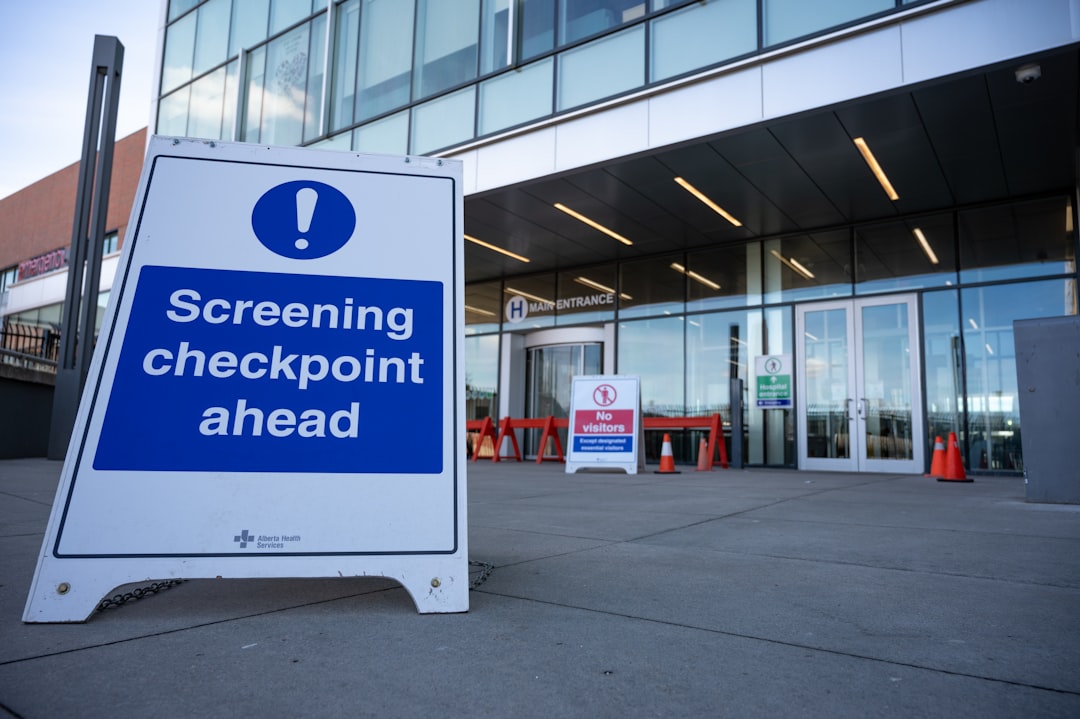 finding therapist Canada — a blue and white sign sitting in front of a building